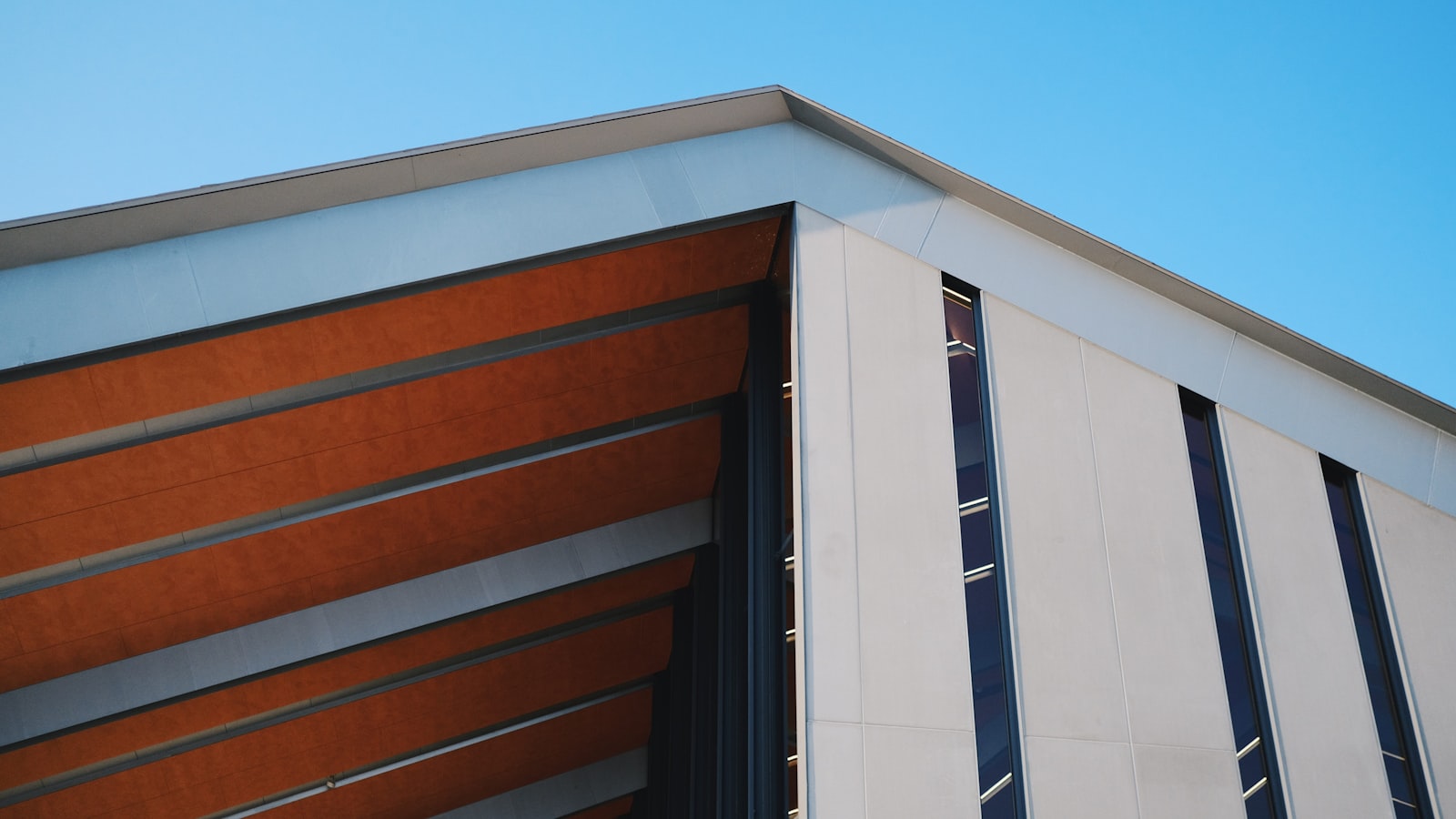 Modern commercial building cladding of the type we soft wash
